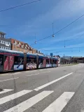 Aarhus light rail line L2 with low-floor articulated tram 1104-1204 near Nørreport (2023)