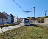 Aarhus light rail line L2 with low-floor articulated tram 1110-1210 by Nørreport (2021)