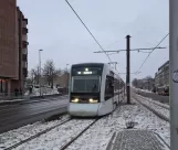 Aarhus light rail line L2 with low-floor articulated tram 2102-2202 at Nørreport (2021)