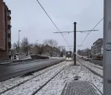 Aarhus light rail line L2 with low-floor articulated tram 2102-2202 near Nørreport (2021)