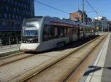 Aarhus light rail line L2 with low-floor articulated tram 2104-2204 at Dokk1 (2023)