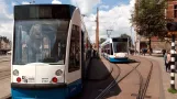 Amsterdam tram line 9 with low-floor articulated tram 2102 at Central Station (2016)