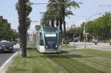 Barcelona tram line T1 with low-floor articulated tram 21 near Maria Cristina (2012)