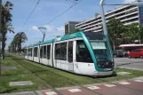 Barcelona tram line T3 with low-floor articulated tram 07 close by Maria Cristina (2012)