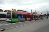 Bremen tram line 1 with low-floor articulated tram 3128 at Bahnhof Mahndorf (2015)