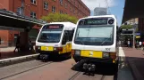 Dallas Red Line with articulated tram 240 at West End Station (2018)