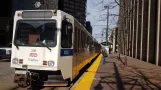 Denver tram line D with articulated tram 338 at 18th / Stout (2020)