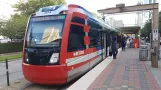 Houston tram line Red with low-floor articulated tram 304 at Memorial Hermann Hospital/Houston Zoo (2018)