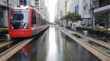 Houston tram line Red with low-floor articulated tram 308 on Main St (2018)