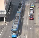 Kassel tram line 1 with low-floor articulated tram 658 near Rathaus (2017)