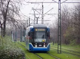 Kraków extra line 12 with low-floor articulated tram 2029 near Krowodra Górka (2007)