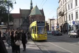 Kraków extra line 6 with low-floor articulated tram 2020 at Plac Wszystkich Świętych (2011)