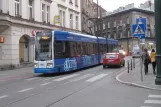 Kraków tram line 7 with low-floor articulated tram 2012 on Ulica Dluga (2011)