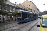 Kraków tram line 8 with low-floor articulated tram 2038 on Stradomska (2011)