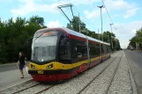 Łódź tram line 11 with low-floor articulated tram 1852 at Pabianicka - r. Lotników Lwowskich (2008)