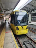 Manchester tram line Blue with articulated tram 3050 at Manchester Airport (2022)