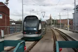 Nottingham tram line Green with low-floor articulated tram 202 "DH Lawrence" at Nottingham Station (2011)