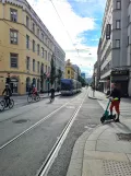 Oslo tram line 13 with low-floor articulated tram 146 on Prinsens gate (2021)