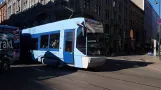 Oslo tram line 18 with low-floor articulated tram 158 on Grensen (2019)