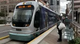 Phoenix Valley Metro Rail with low-floor articulated tram 106 at Washington/Central Ave (2021)