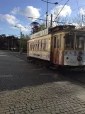 Porto tram line 22 with railcar 220 at Carmo (2019)