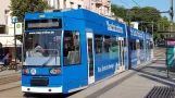 Rostock tram line 1 with low-floor articulated tram 654 at Doberaner Platz (2022)