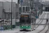 Saint-Étienne tram line T3 with low-floor articulated tram 922 on Boulevard Pierre-Antoine et Jean-Michel Dalgabio (2007)