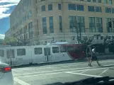 Salt Lake City regional line 701 Blue Line with articulated tram 1017 at Planetarium (2022)