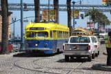 San Francisco F-Market & Wharves with railcar 1010 in the intersection The Embarcadero/Don Chee Way (2010)