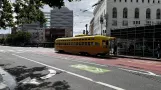 San Francisco F-Market & Wharves with railcar 1052 in the intersection Market Street & Larkin Street (2022)