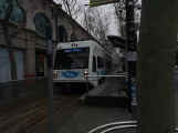 San Jose Blue Line with low-floor articulated tram 978 at San Antonio (2023)