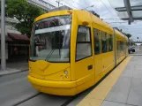 Seattle South Lake Union with low-floor articulated tram 406 at S Jackson St & 5th Ave S (2016)