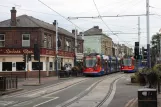 Sheffield Purple Route with low-floor articulated tram 112 on Langsett Road (2011)