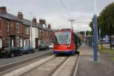 Sheffield tram line Blue with low-floor articulated tram 117 at Malin Bridge (2011)