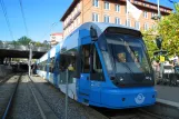 Stockholm tram line 30 Tvärbanan with low-floor articulated tram 401 at Alvik (2011)