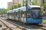 Stockholm tram line 30 Tvärbanan with low-floor articulated tram 406 at Sickla udde (2009)