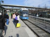 Stockholm tram line 30 Tvärbanan with low-floor articulated tram 413 at Årstaberg (2019)