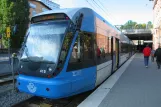 Stockholm tram line 30 Tvärbanan with low-floor articulated tram 415 at Alvik (2011)