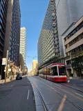 Toronto tram line 506 Carlton with low-floor articulated tram 4436 at Carton Street at Church Street (2023)