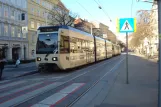 Vienna regional line 515 - Badner Bahn with low-floor articulated tram 404 at Mayerhofgasse (2014)