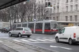 Vienna tram line 1 with low-floor articulated tram 654 on Schottenring (2013)