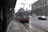 Vienna tram line 1 with low-floor articulated tram 758 at Burgring (2013)