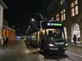 Zürich tram line 4 with low-floor articulated tram 3032 at Rathaus (2020)