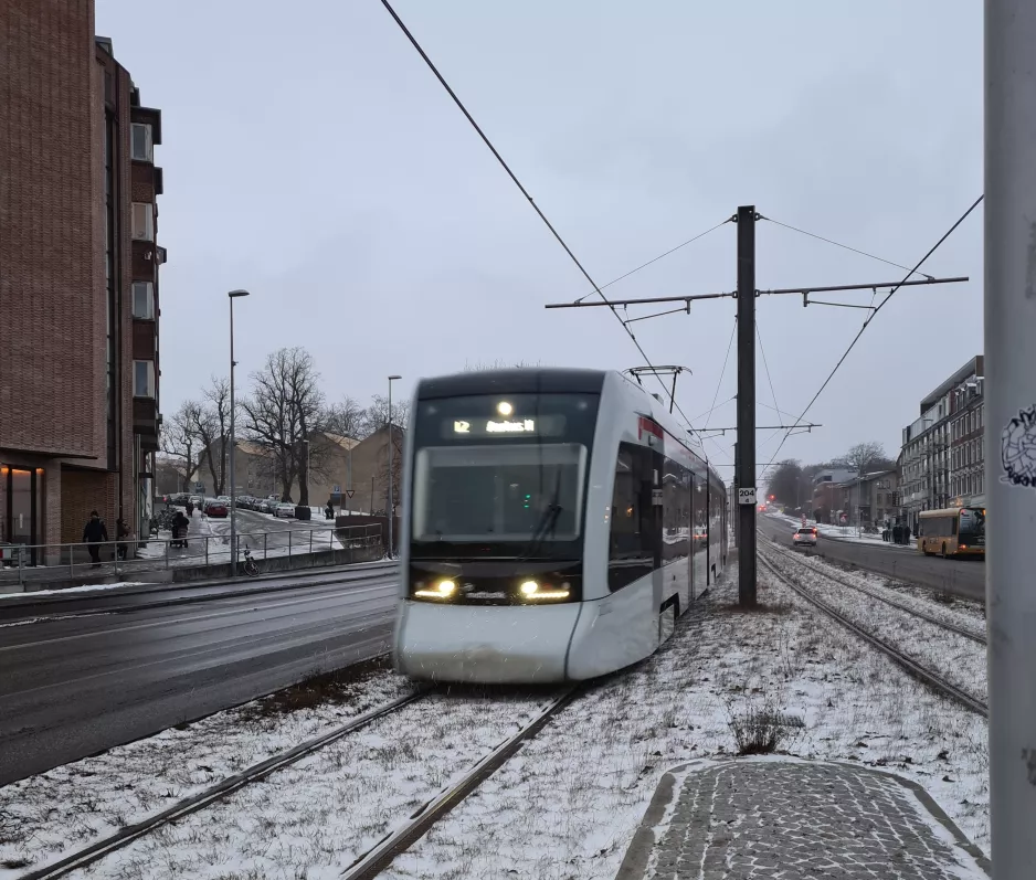 Aarhus light rail line L2 with low-floor articulated tram 2102-2202 at Nørreport (2021)