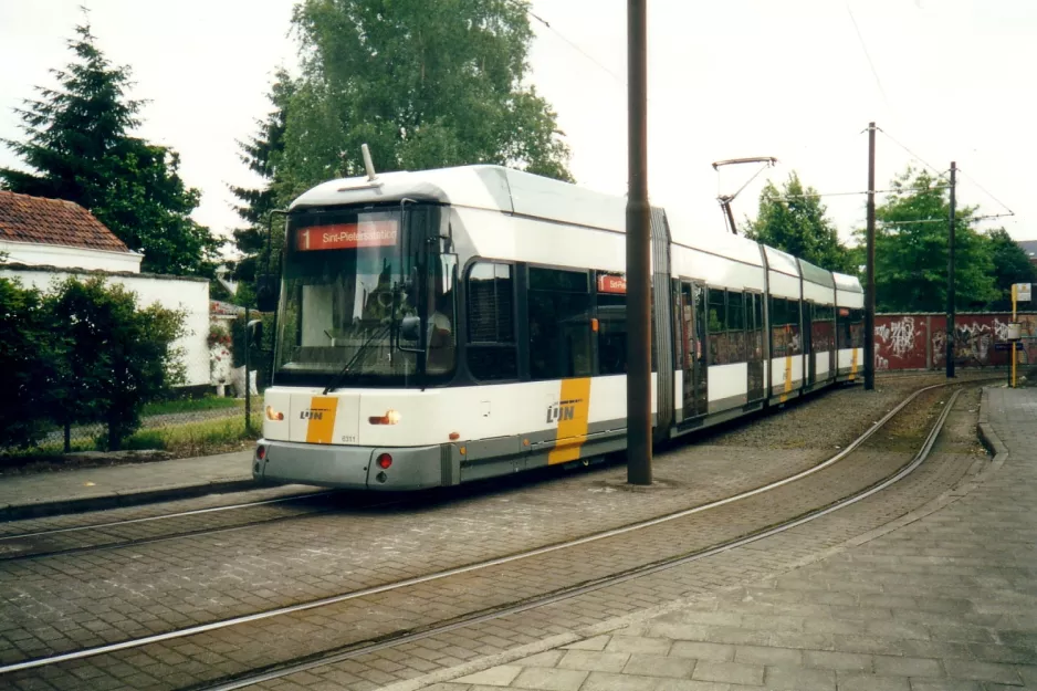 Ghent tram line T1 with low-floor articulated tram 6311 near Francisco Ferrerlaan (2002)