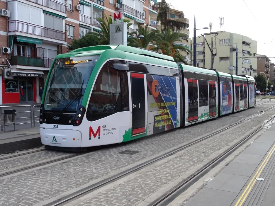 Granada tram line M1 with low-floor articulated tram 309 at Villarejo (2024)