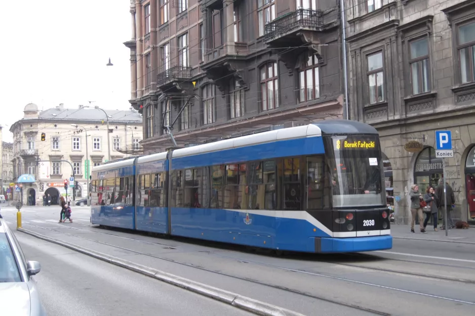 Kraków tram line 8 with low-floor articulated tram 2030 at Stradom (2011)