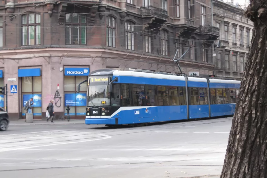 Kraków tram line 8 with low-floor articulated tram 2041 close by Stradom (2011)