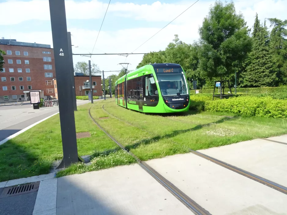 Lund tram line 1 with low-floor articulated tram 05 (Inferno) near Universitetssjukhuset (2022)