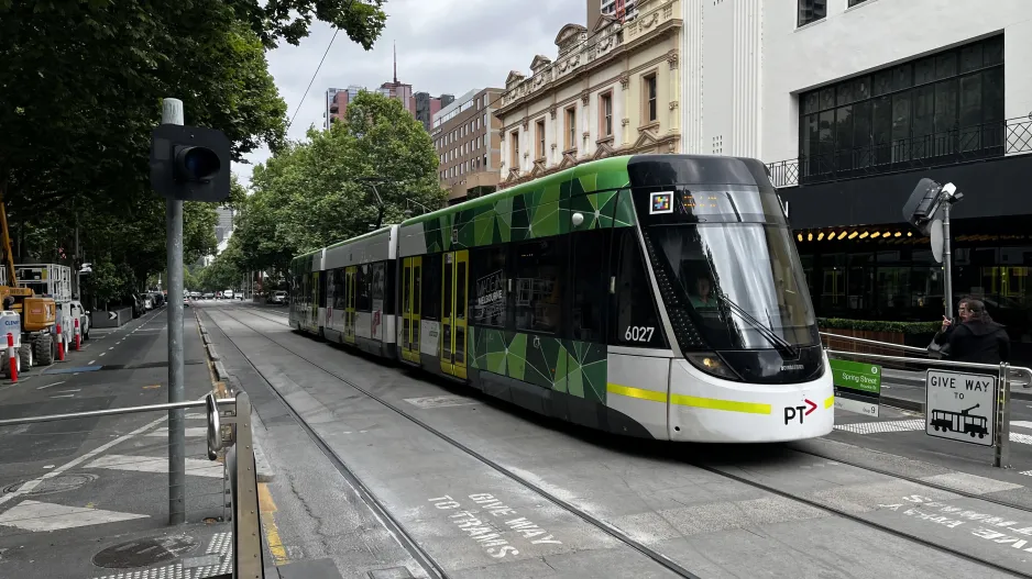 Melbourne low-floor articulated tram 6027 at Spring Street/Bourke Street (2024)